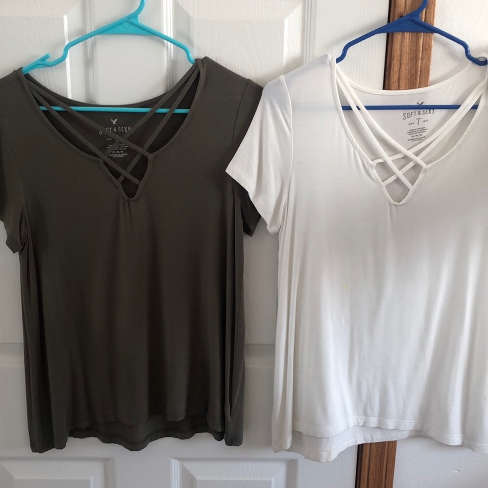 2 white and army green shirts American eagle